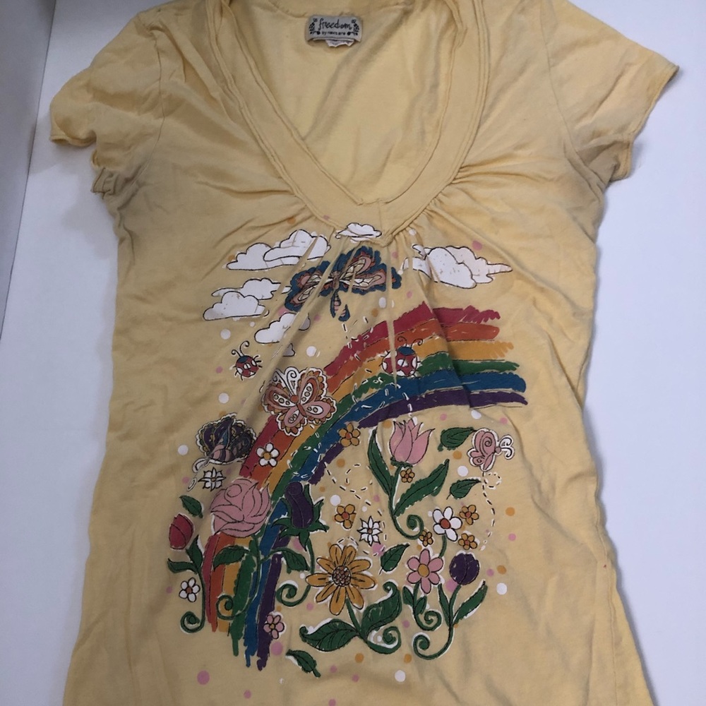 Beautiful yellow T-shirt with flower and butterfly